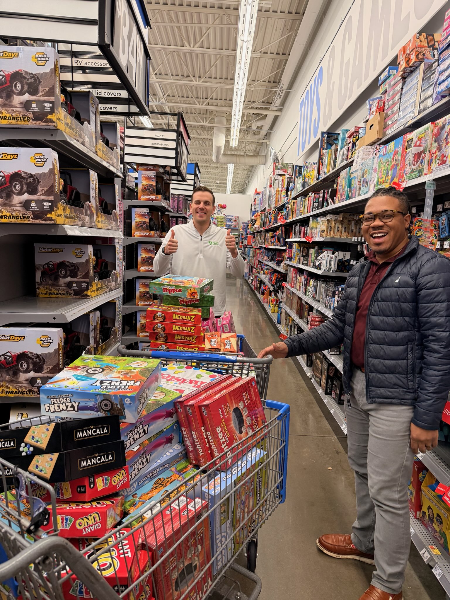 Volunteers shopping for the 2025 gift campaign